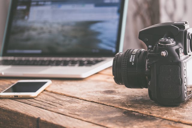 camera, phone, and laptop
