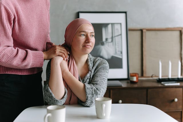 a woman supporting her friend with cancer