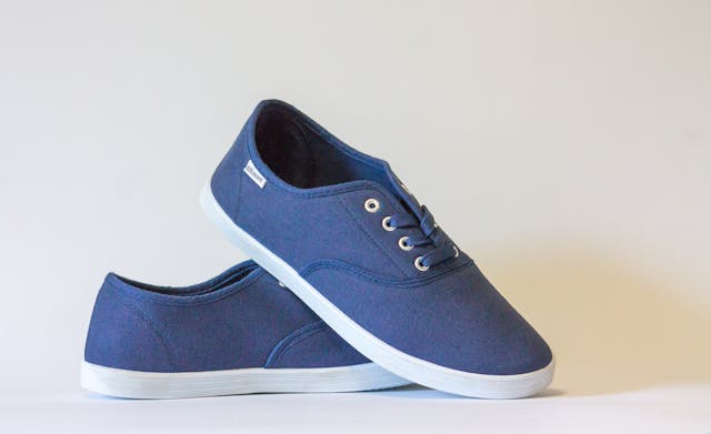 a pair of shoes with rubber soles