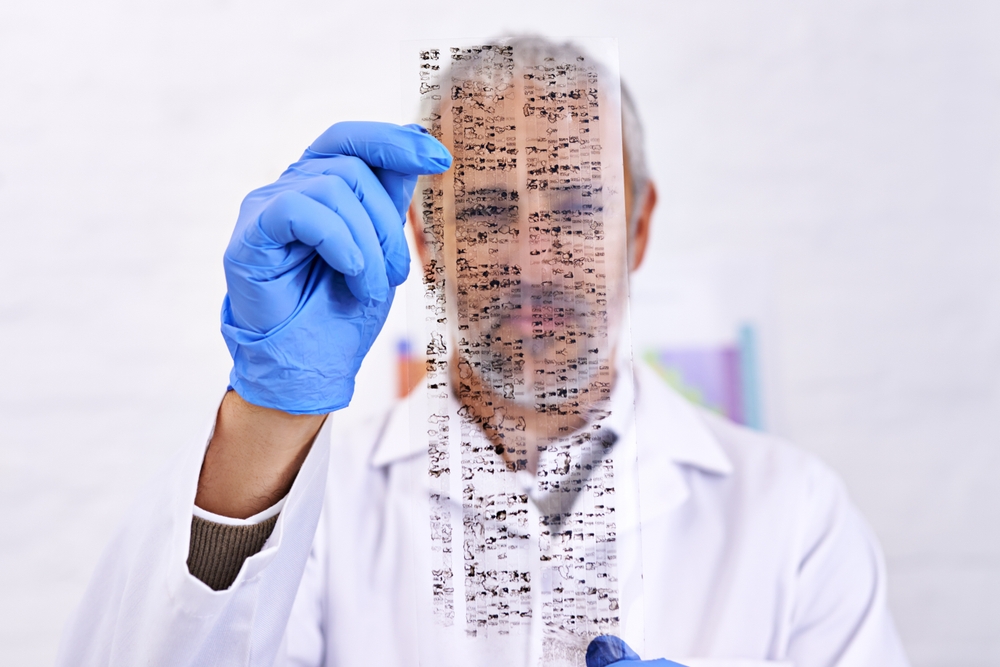 Dna chart, science and medicine with man in laboratory for genetic testing, rh blood group and enzyme test. Healthcare, research and medical with person and genome discovery for chemical analysis