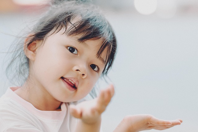 A young girl looking at the camera