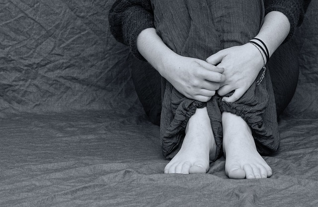 a woman sitting on the floor