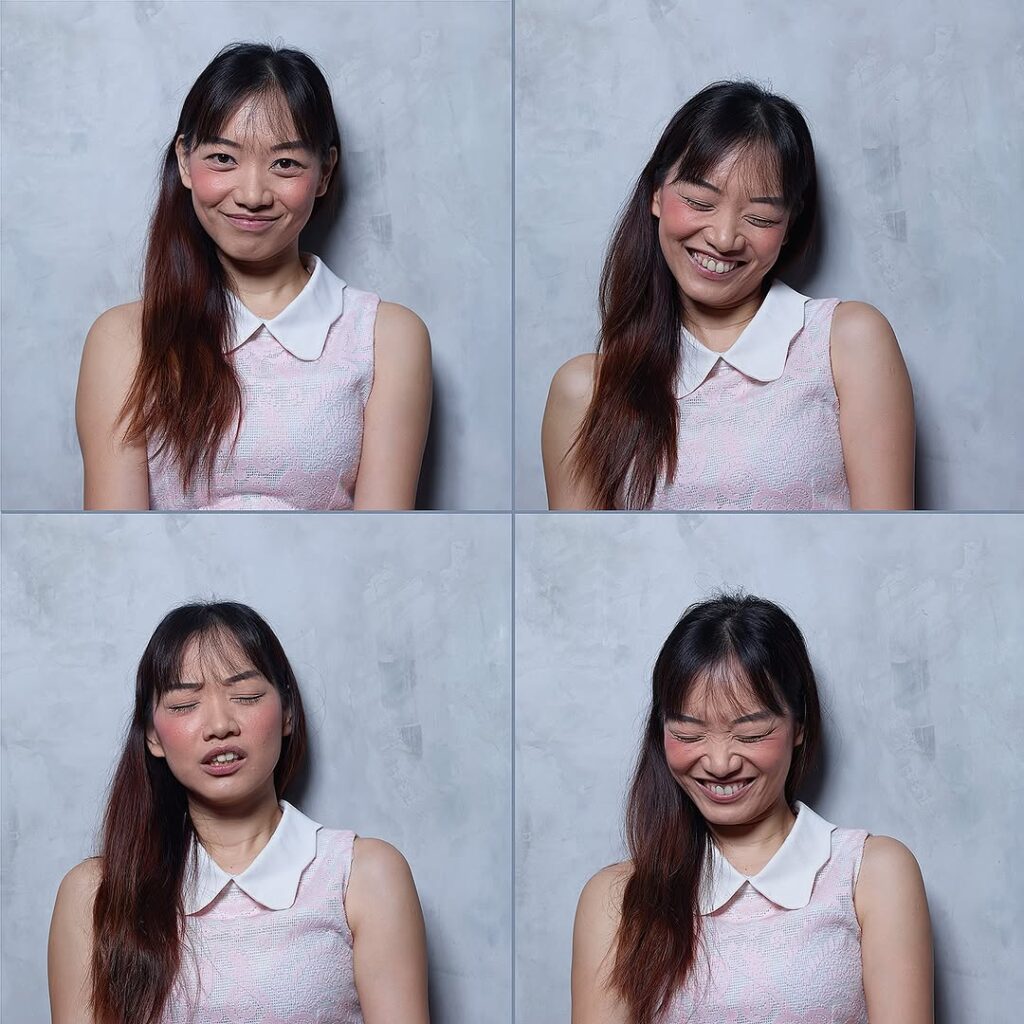 happy woman in pink and white shirt smiling