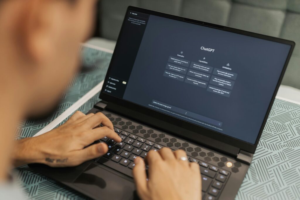 Man Using Laptop wit Chat GPT
