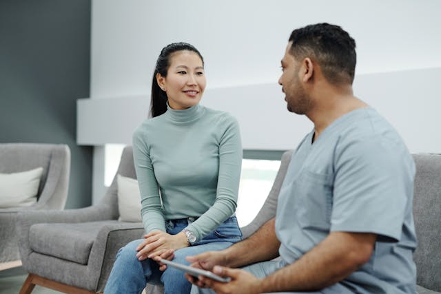 doctor speaking to woman