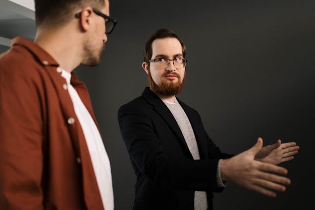 Man explainging something to another man