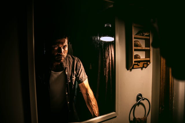 man looking into the mirror