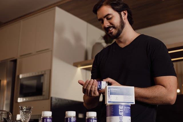 man taking vitamins