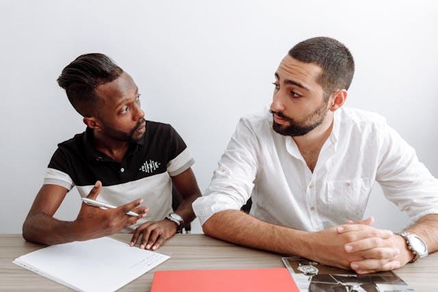 two men talking