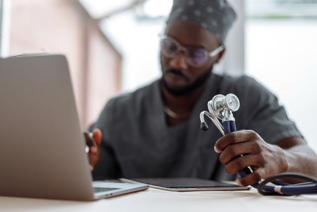 doctor working on laptop