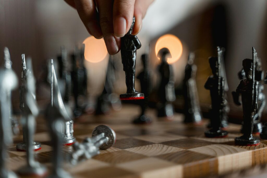 Chess pieces being moved