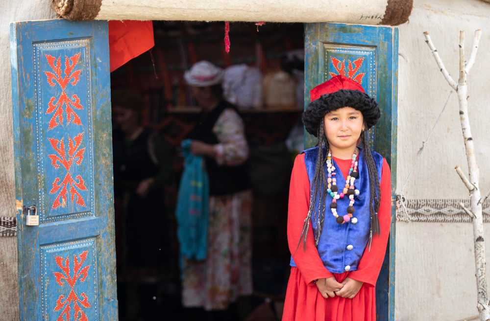 Lake Issyk-Kul, Kurgyzstan, 6th September 2018: local lady in full Kyrgyz outfit