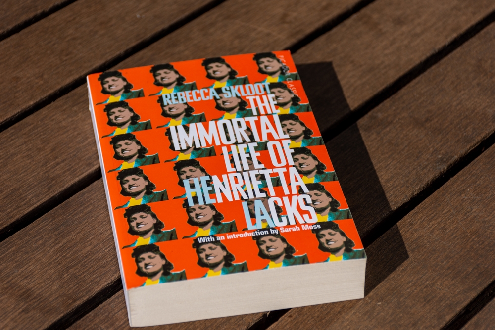 Setif, Algeria - November 18, 2023: Close-up of Rebecca Skloot's The Immortal Life of Henrietta Lacks book on a wooden table.
