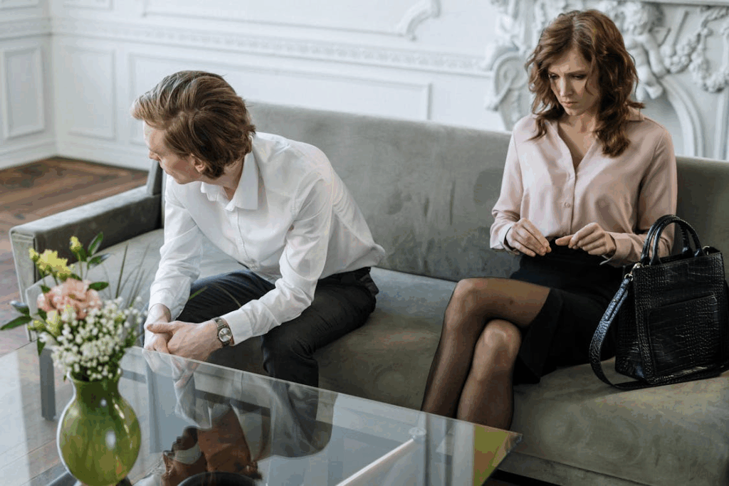 Couple on a couch being upset