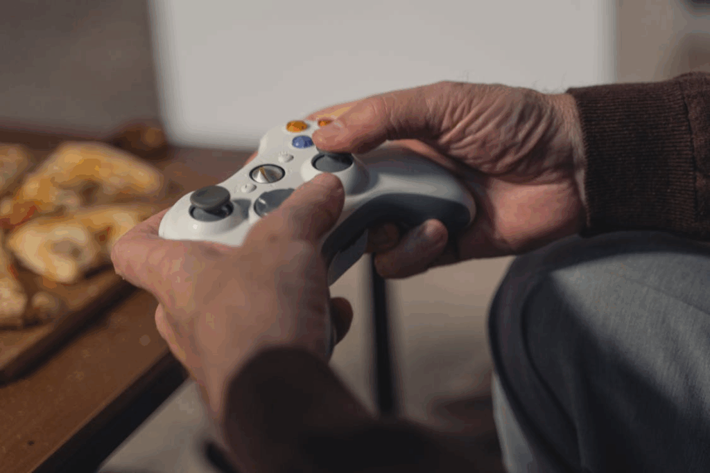 Person Holding White Xbox One Controller