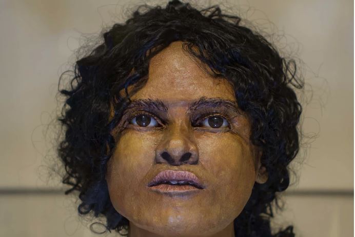 old version of the woman's face