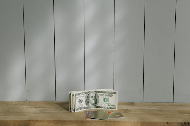 money on a wooden bench