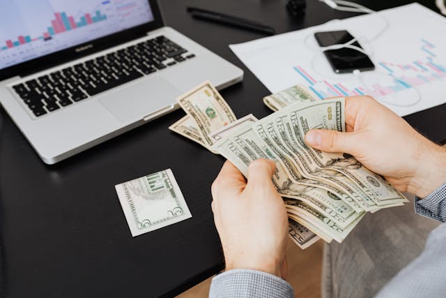 person counting money