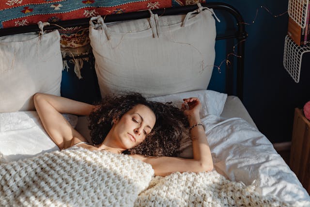 Woman lying in bed