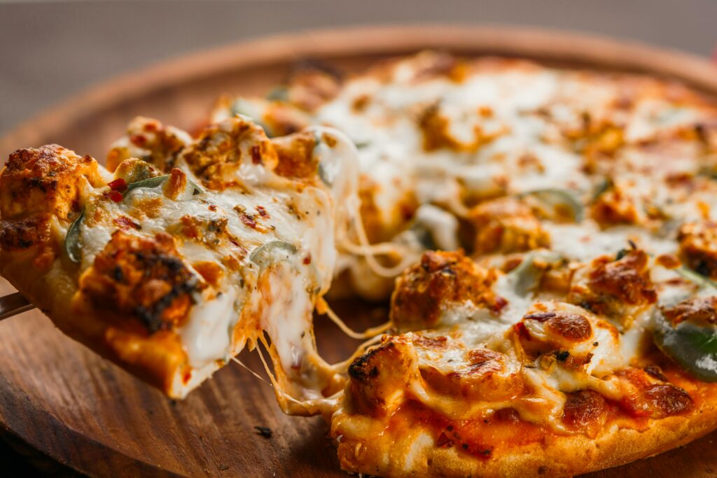Delicious Cheesy Pizza Slice with Toppings