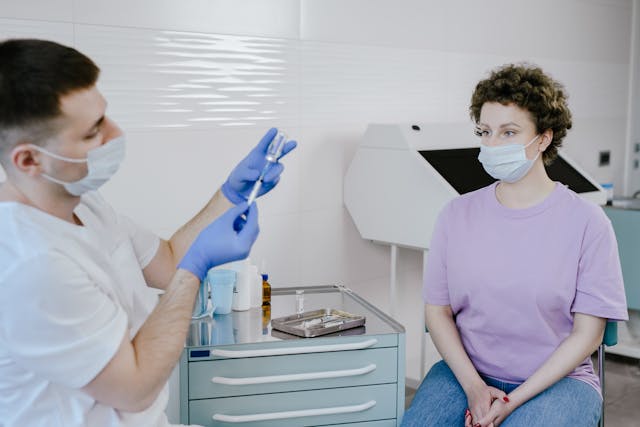 doctor preparing vaccine