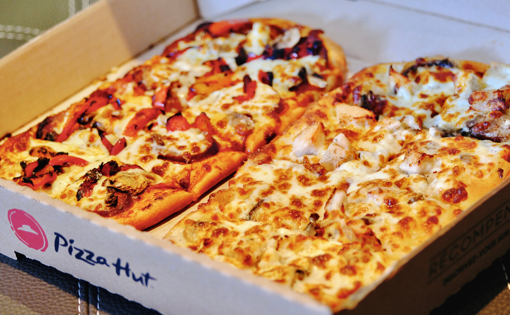 Pizza Hut flatbread pizza-a new, low-calorie range of Pizzas! The picture shows Italian meat and chicken and mushroom topped flatbread pizzas