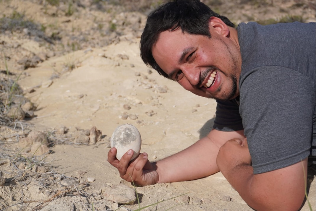 Team leader and world-class anatomist Federico Agnolín is holding the intact dinosaur egg