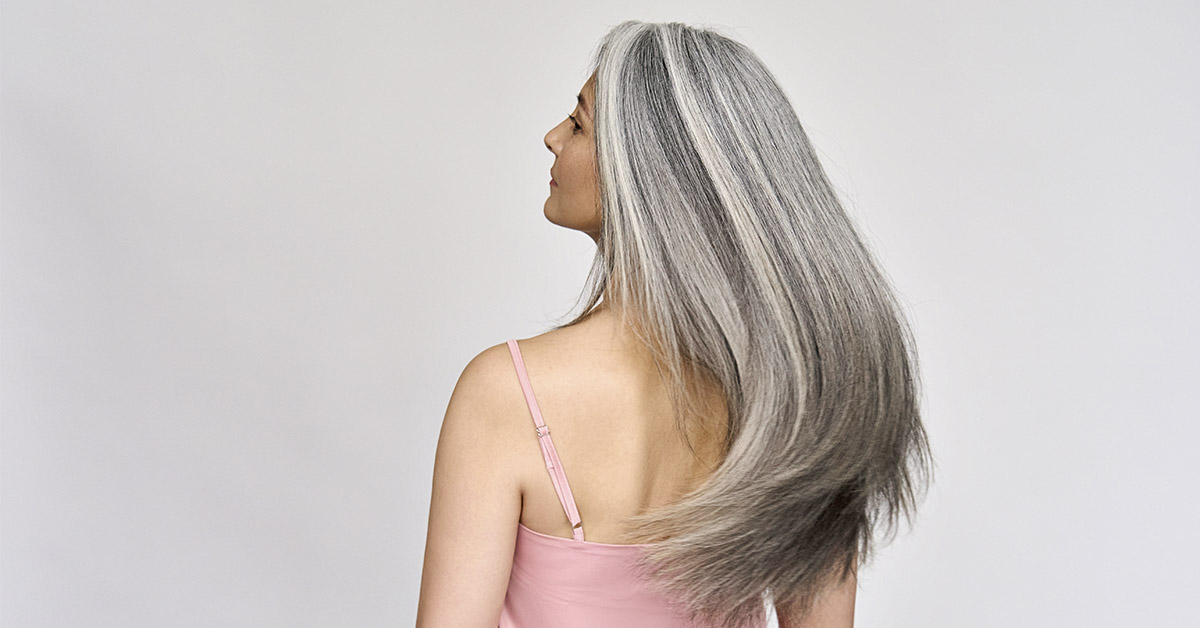 What It Means to Let Your Grey Hair Grow and Not Dye It, According to Psychology