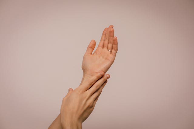 woman touching her skin