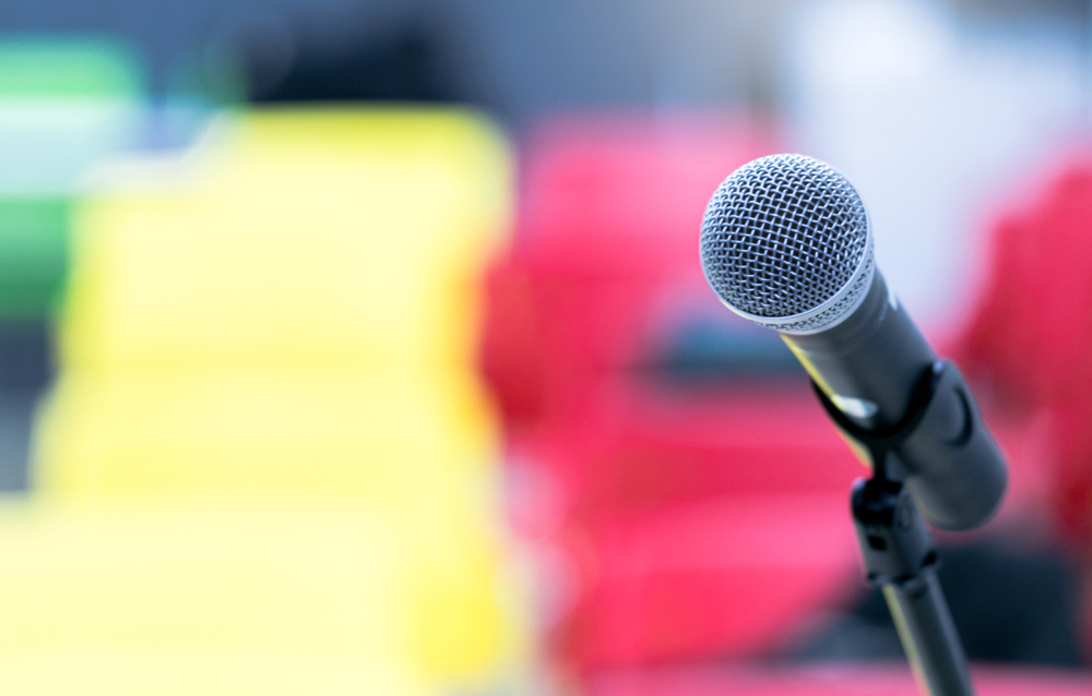microphones are installed in the conference room for the show team meeting