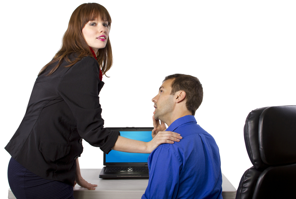 female coworker is flirting to get favors at work