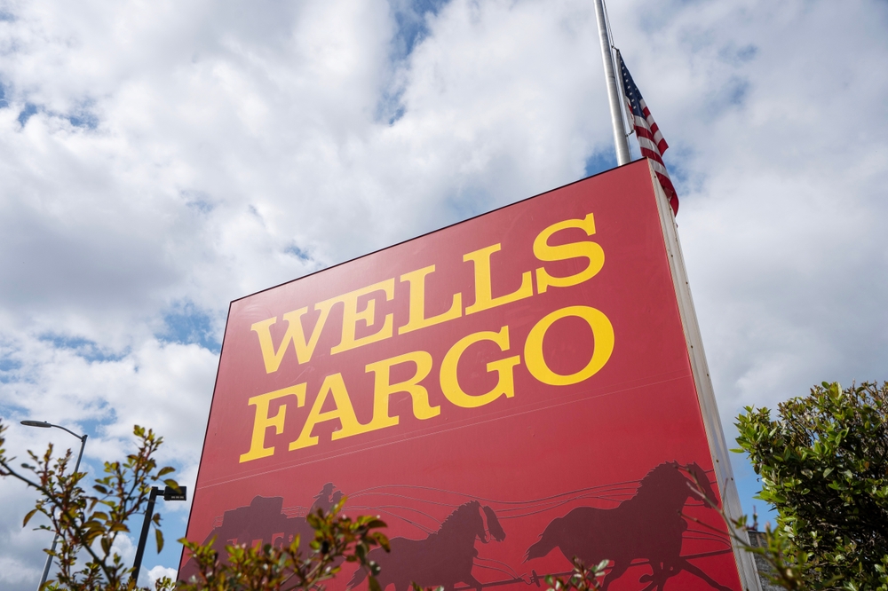 Salem, OR, USA - Mar 31, 2022: Low angle view of the Wells Fargo sign at one of its branches in Salem, Oregon. Wells Fargo and Company is an American multinational financial services corporation.