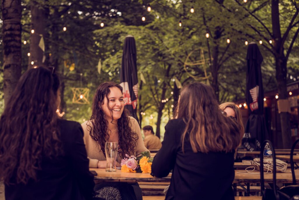 People Sitting at the Table Together