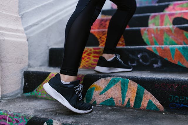woman walking up stairs