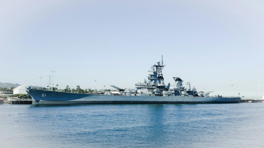 White Ship on Sea Under Blue Sky