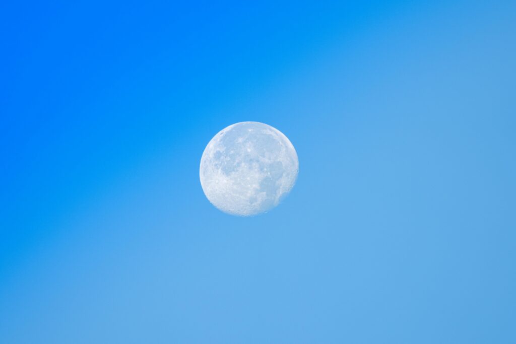 Full Moon in Clear Blue Daytime Sky