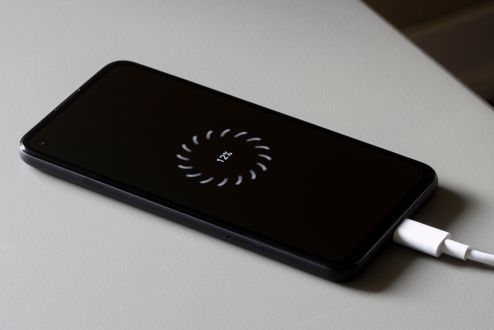 Portland, OR, USA - May 1, 2021: A Google Pixel 4a smartphone is charging.