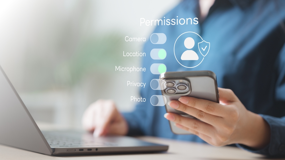 privacy, consent, settings, cookie, gdpr, data, User managing mobile app permissions and privacy settings including location, camera, and data security for compliance with GDPR and online protection.
