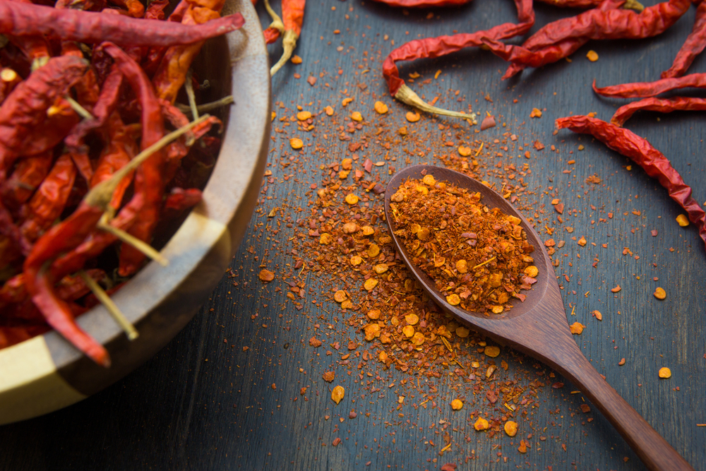 Cayenne pepper on the wooden floor