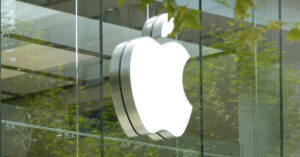 Apple Retires 15 Devices in Silent Purge—Could Yours Be Next? Apple logo on a glass storefront, typically associated with an Apple retail store or authorized reseller.