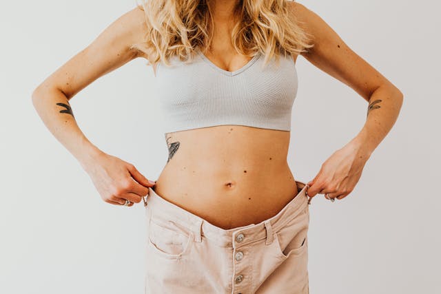 woman holding pants