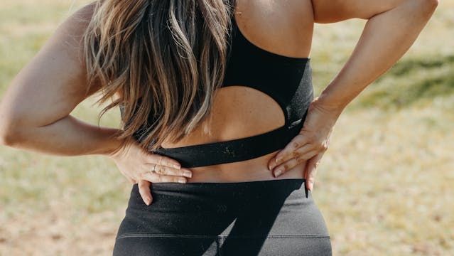 woman holding hips
