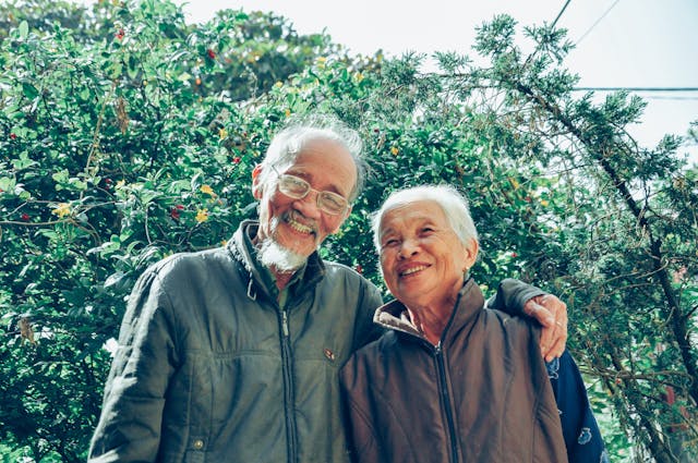 happy elderly couple outdoors