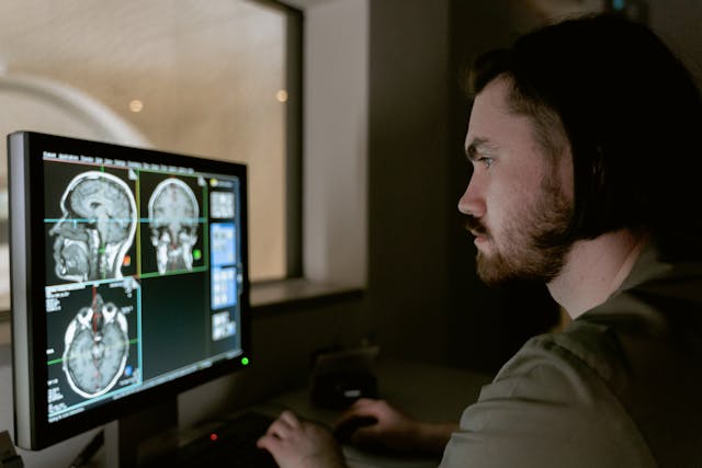 doctor looking at brainscan