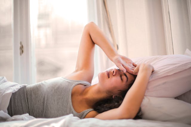 woman lying in bed