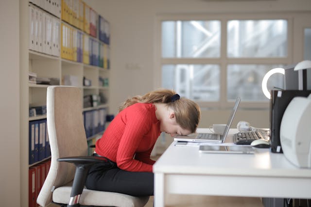 tired woman at work