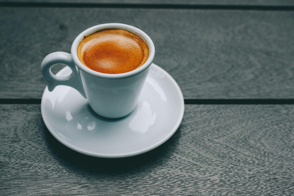 White Ceramic Mug and Saucer.