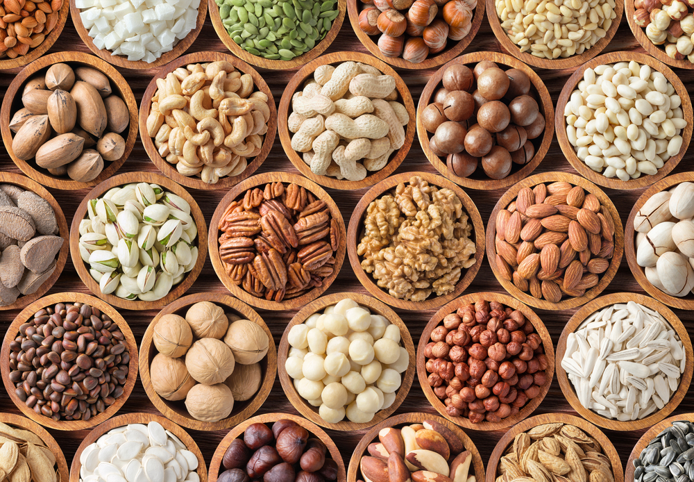 collection nuts and seeds background, healthy snacks for food.