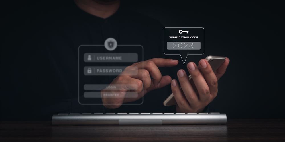 Two steps authentication or 2FA concept. 2023 Verification code and key icon on smart phone screen with keyboard computer for validate password page, Identity verification, cyber security technology.