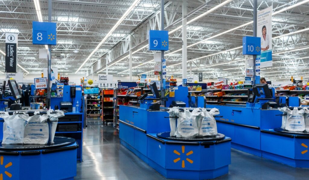 Cashier counter in Walmart. Walmart Inc. is an American multinational retail corporation operates a chain of hypermarkets, discount department stores, and grocery stores